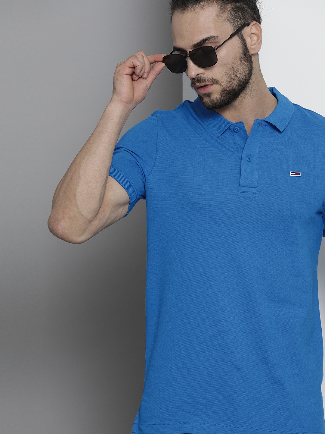 

Tommy Hilfiger Men Blue Solid Polo Collar Slim Fit T-shirt