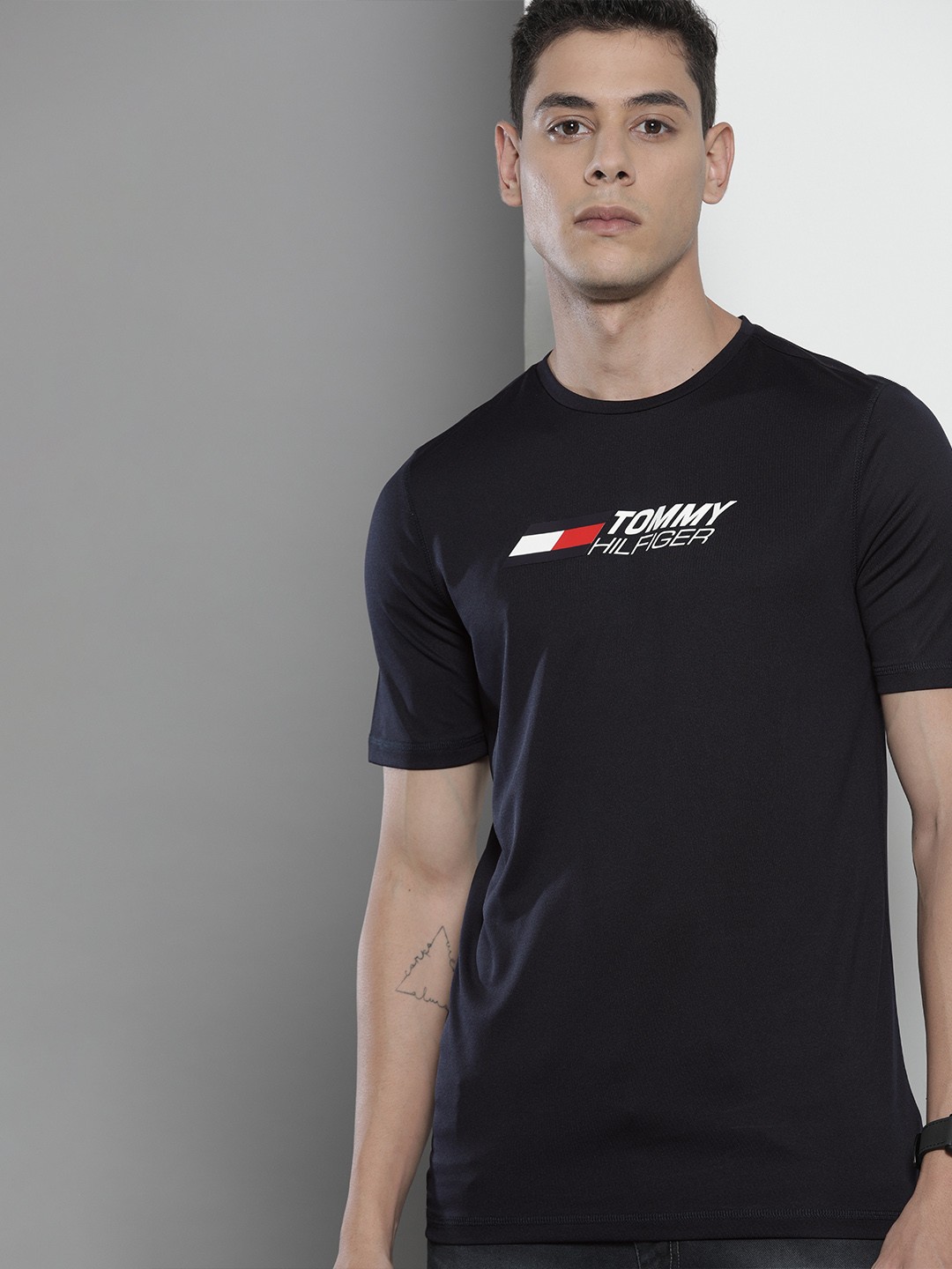 

Tommy Hilfiger Men Navy Blue Brand Logo Printed Slim Fit T-shirt
