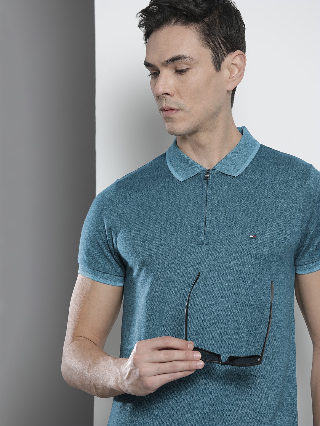 

Tommy Hilfiger Men Teal Blue Solid Polo Collar Slim Fit Pure Cotton T-shirt