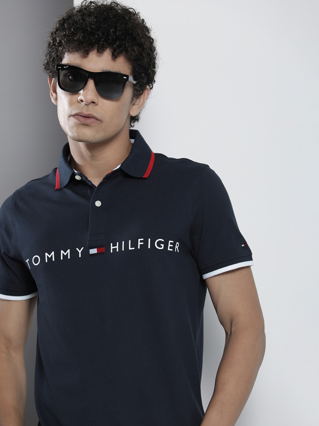 

Tommy Hilfiger Men Navy Blue & White Typography Printed Polo Collar Slim Fit T-shirt