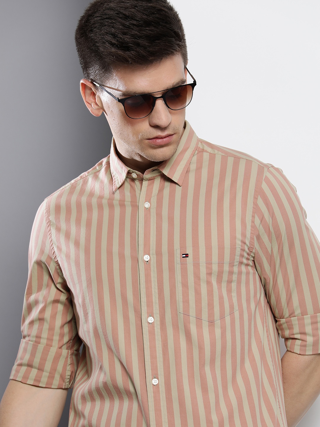 

Tommy Hilfiger Men Pink & Tan Slim Fit Striped Casual Shirt