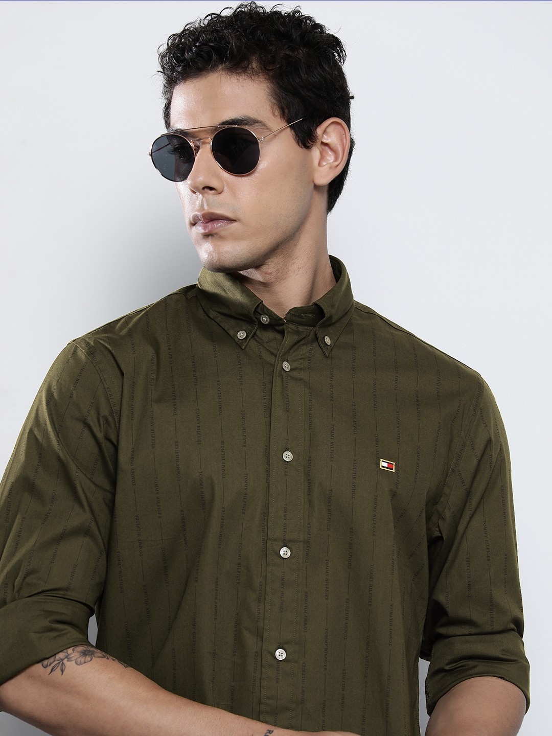 

Tommy Hilfiger Men Olive Green Stripe And Brand Logo Printed Casual Shirt