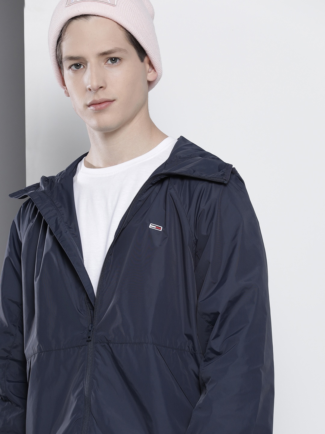 

Tommy Hilfiger Men Navy Blue Solid Windcheater Packable Hooded Sporty Jacket