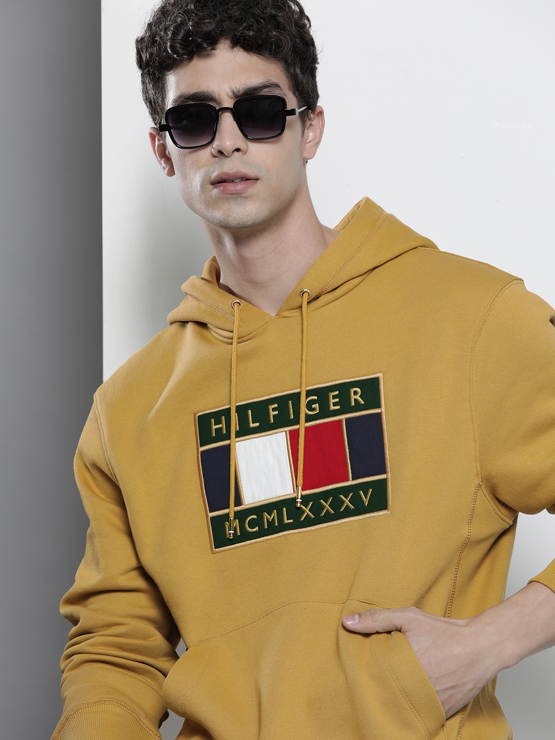 

Tommy Hilfiger Men Mustard Embroidered Hooded Sweatshirt