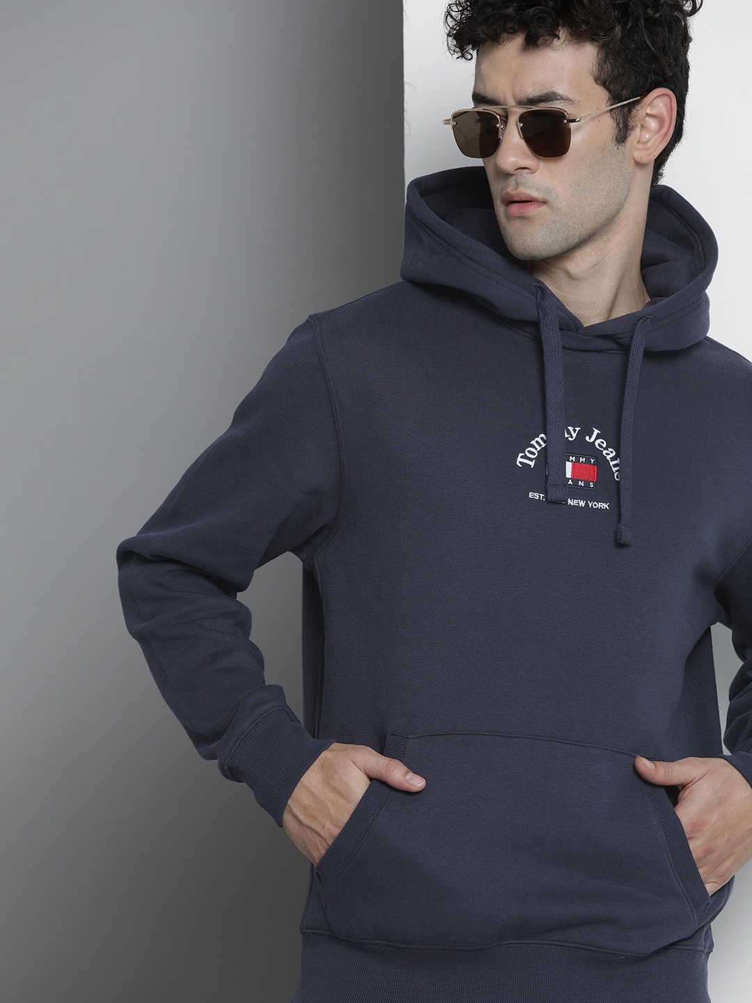 

Tommy Hilfiger Men Navy Blue & White Printed Hooded Sweatshirt