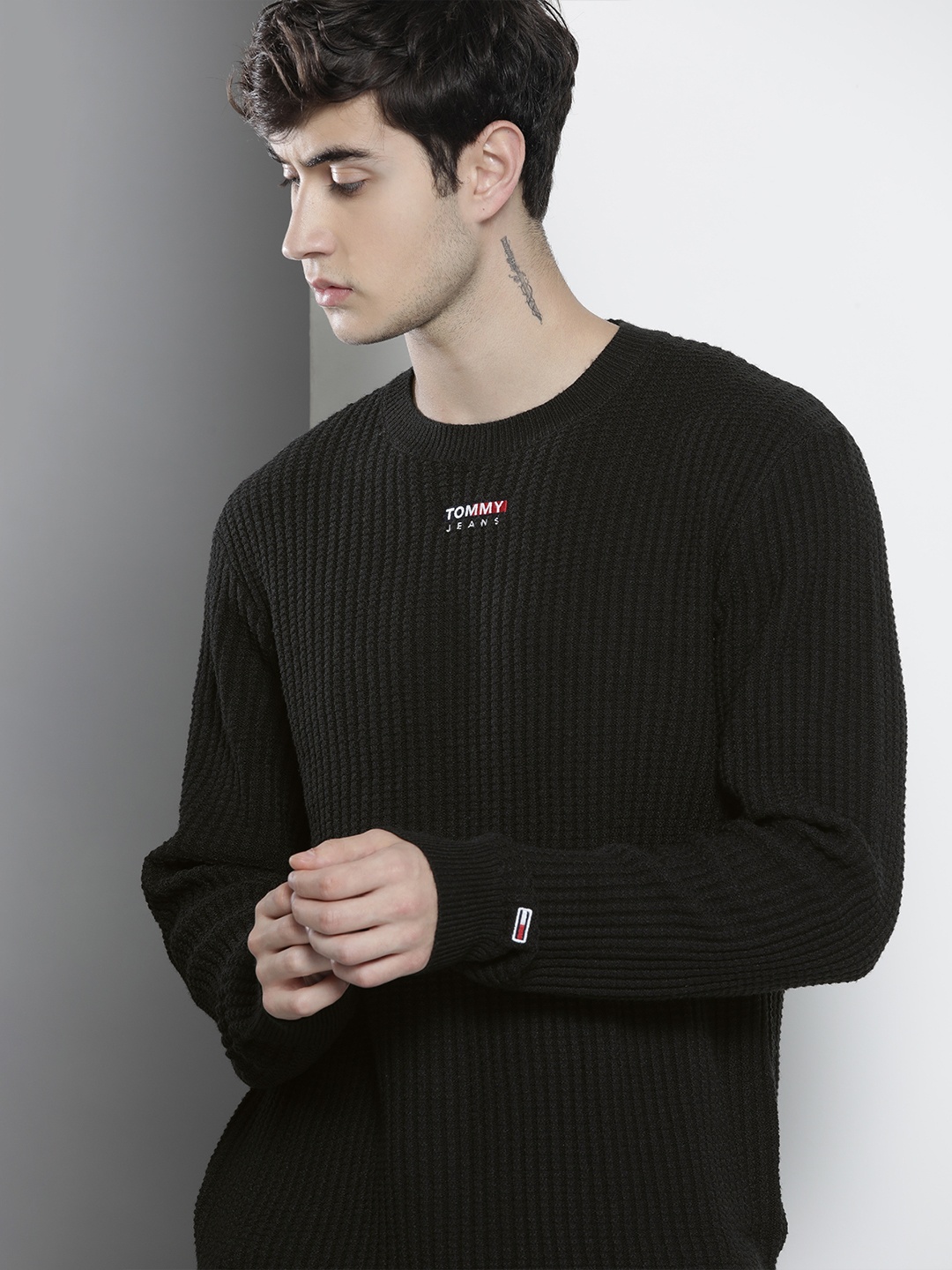 

Tommy Hilfiger Men Black Self Striped Pullover Sweater