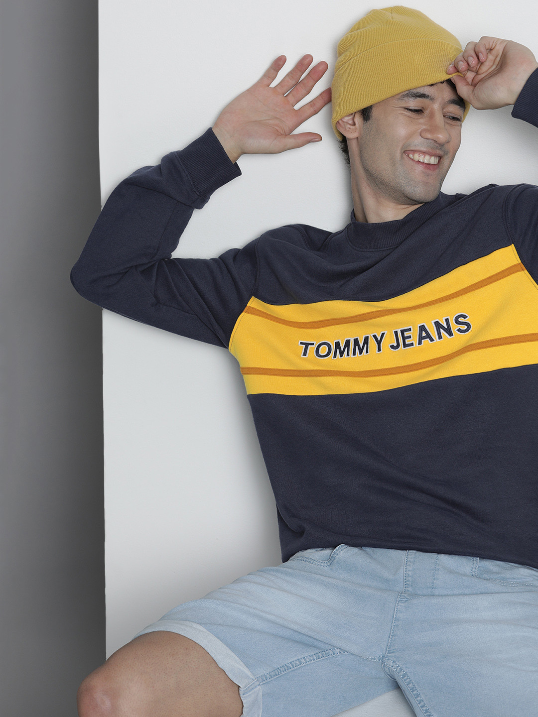 

Tommy Hilfiger Men Navy Blue and Yellow Colourblocked Pure Organic Cotton Sweatshirt