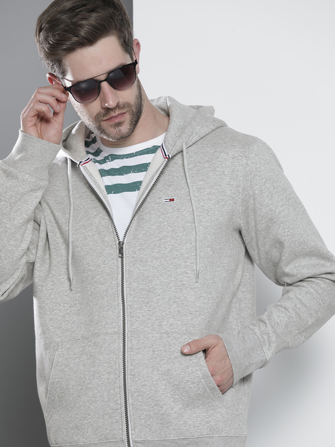 

Tommy Hilfiger Men Grey Solid Hooded Sweatshirt