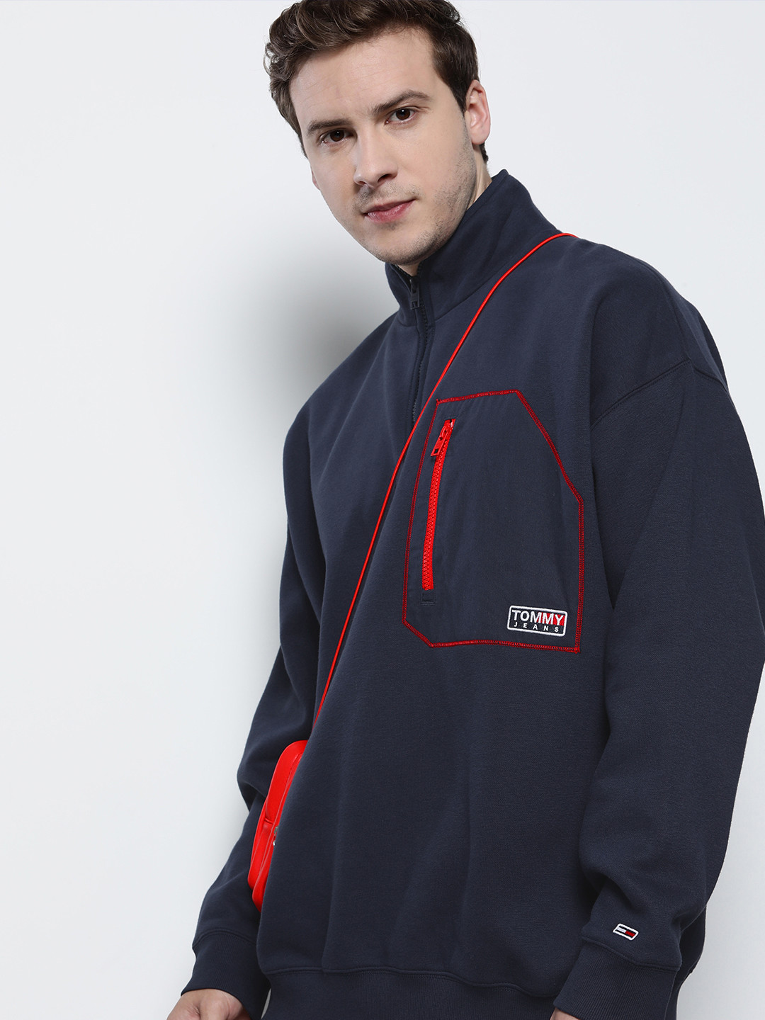 

Tommy Hilfiger Men Navy Blue Brand Logo Embroidered Sweatshirt With Contrast Zip Pocket