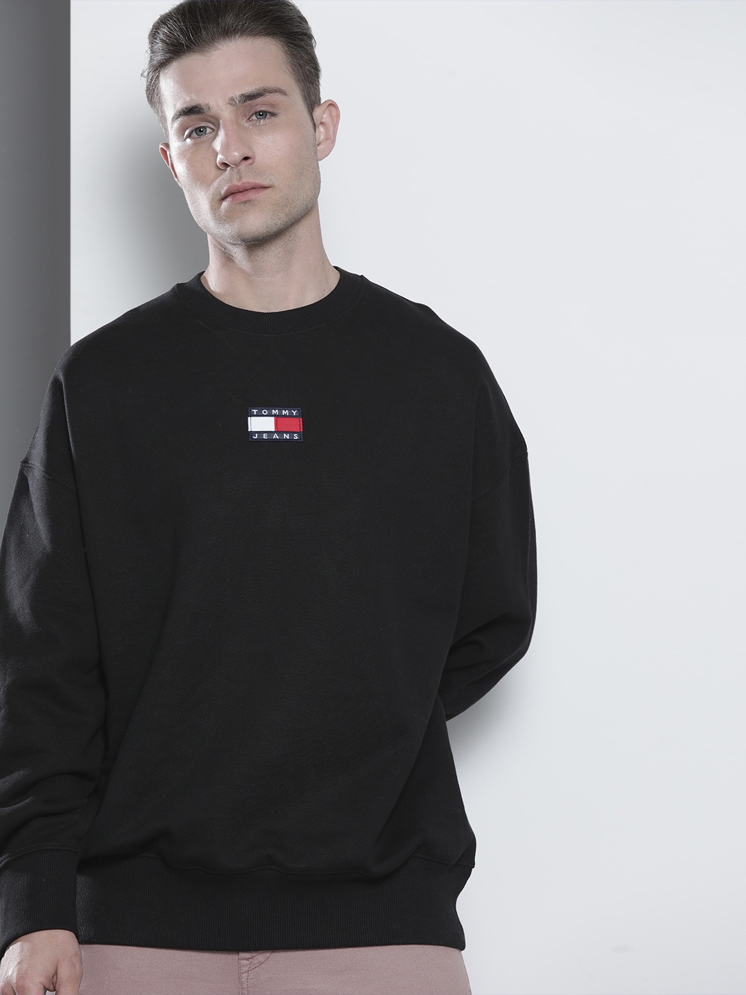 

Tommy Hilfiger Men Black Solid Pure Cotton Sweatshirt