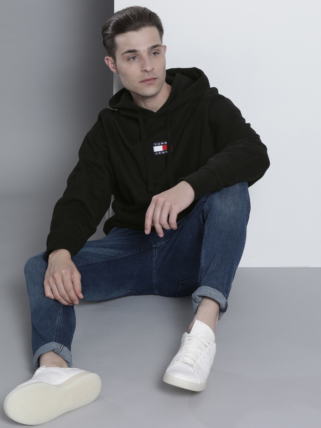 

Tommy Hilfiger Men Black Solid Organic Cotton Hooded Sweatshirt