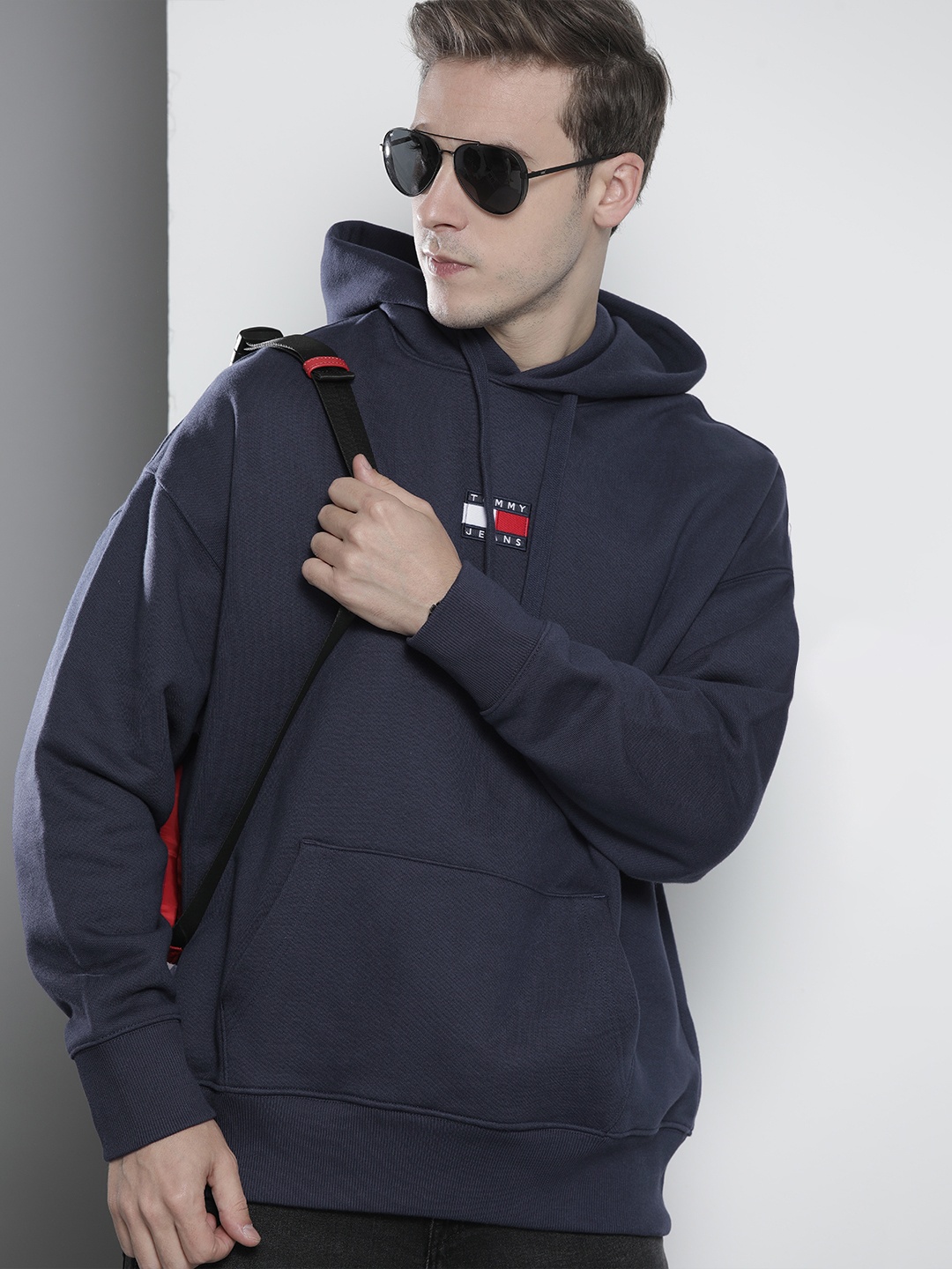 

Tommy Hilfiger Men Navy Blue Hooded Sweatshirt