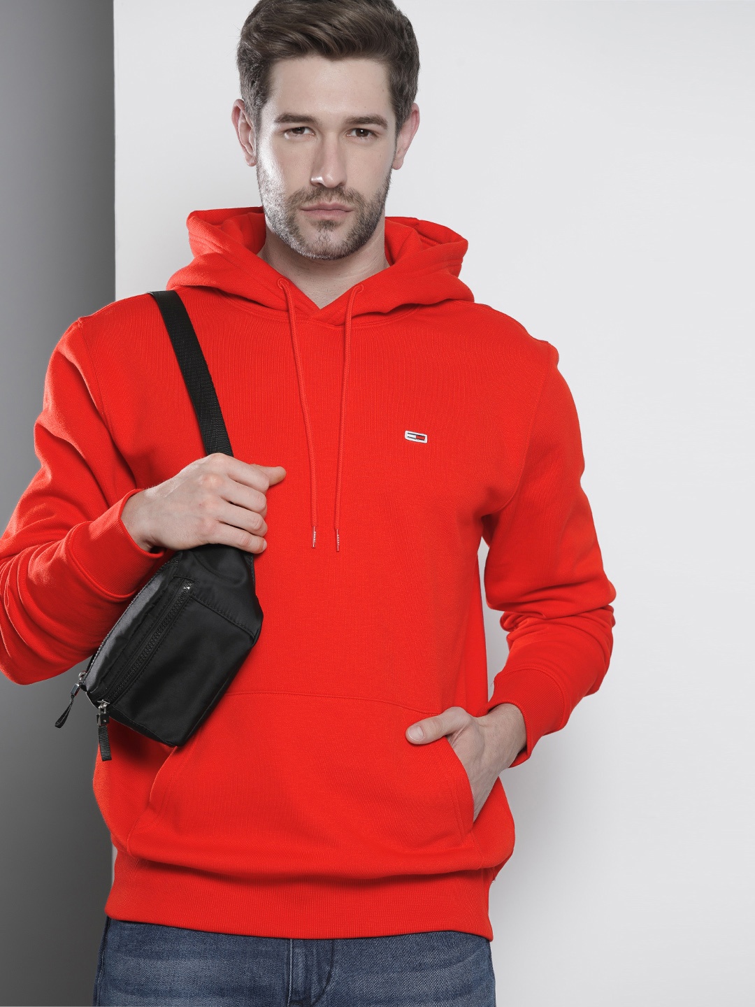 

Tommy Hilfiger Men Red Solid Hooded Sweatshirt