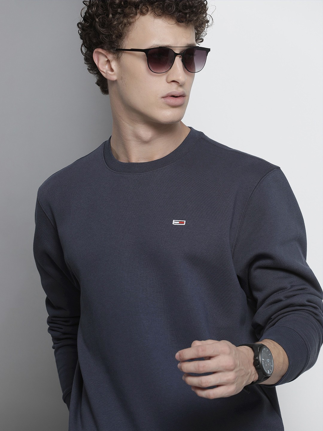 

Tommy Hilfiger Men Navy Blue Solid Sweatshirt