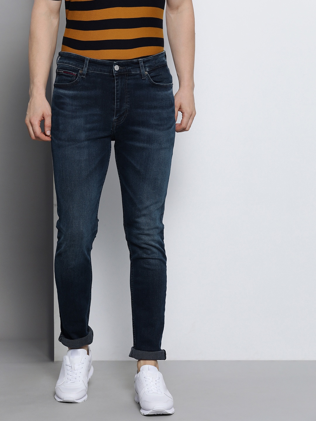 

Tommy Hilfiger Men Blue Skinny Fit Mid-Rise Light Fade Stretchable Jeans