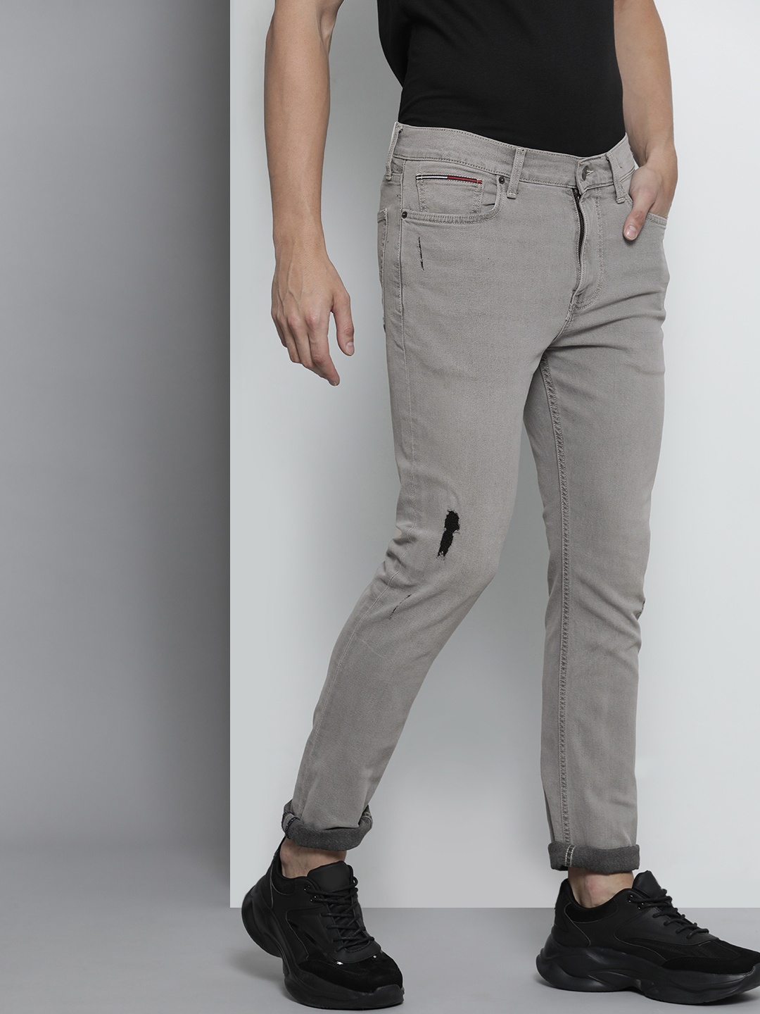 

Tommy Hilfiger Men Grey Simon Skinny Fit Mid-Rise Mildly Distressed Stretchable Jeans