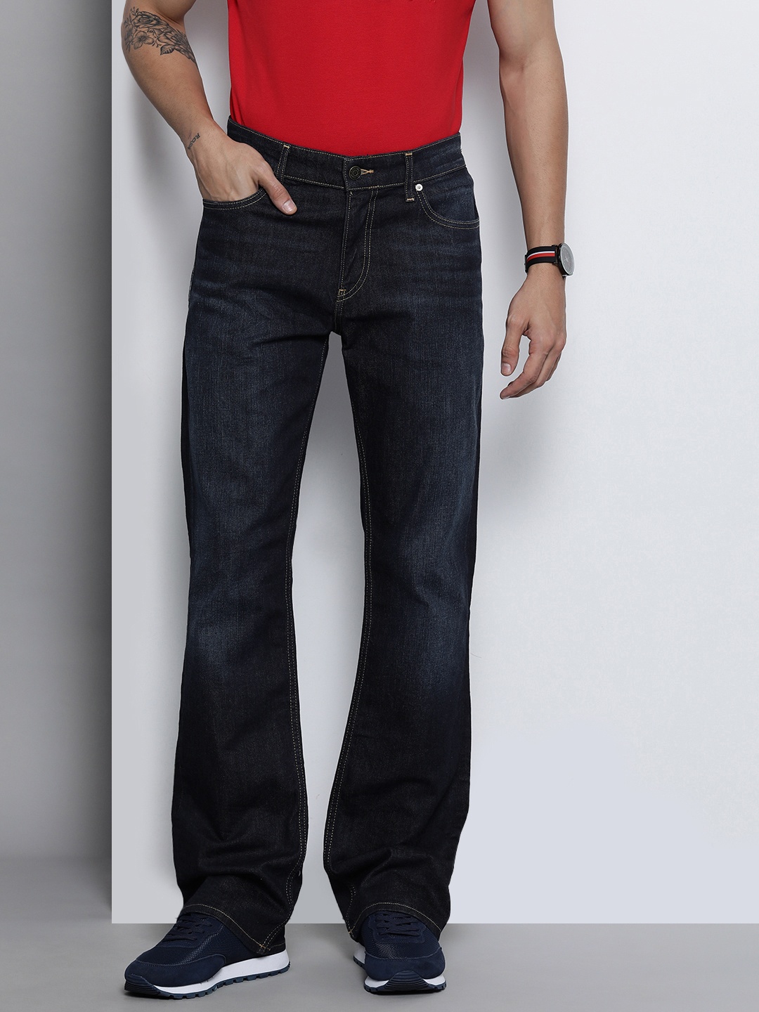 

Tommy Hilfiger Men Navy Blue Light Fade Stretchable Bootcut Casual Jeans