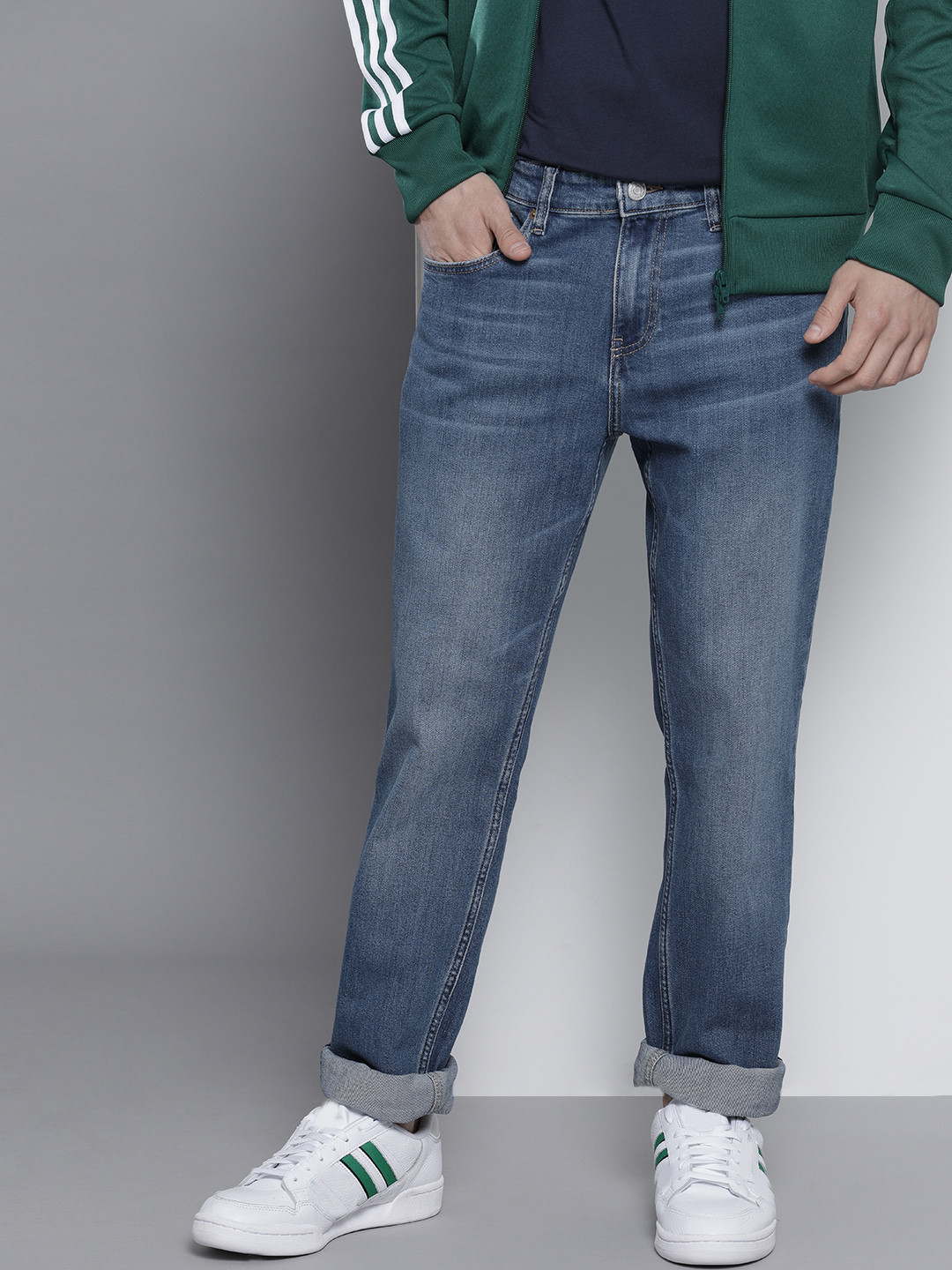 

Tommy Hilfiger Men Blue Ryan Relaxed Straight Fit Light Fade Mid Rise Stretchable Jeans