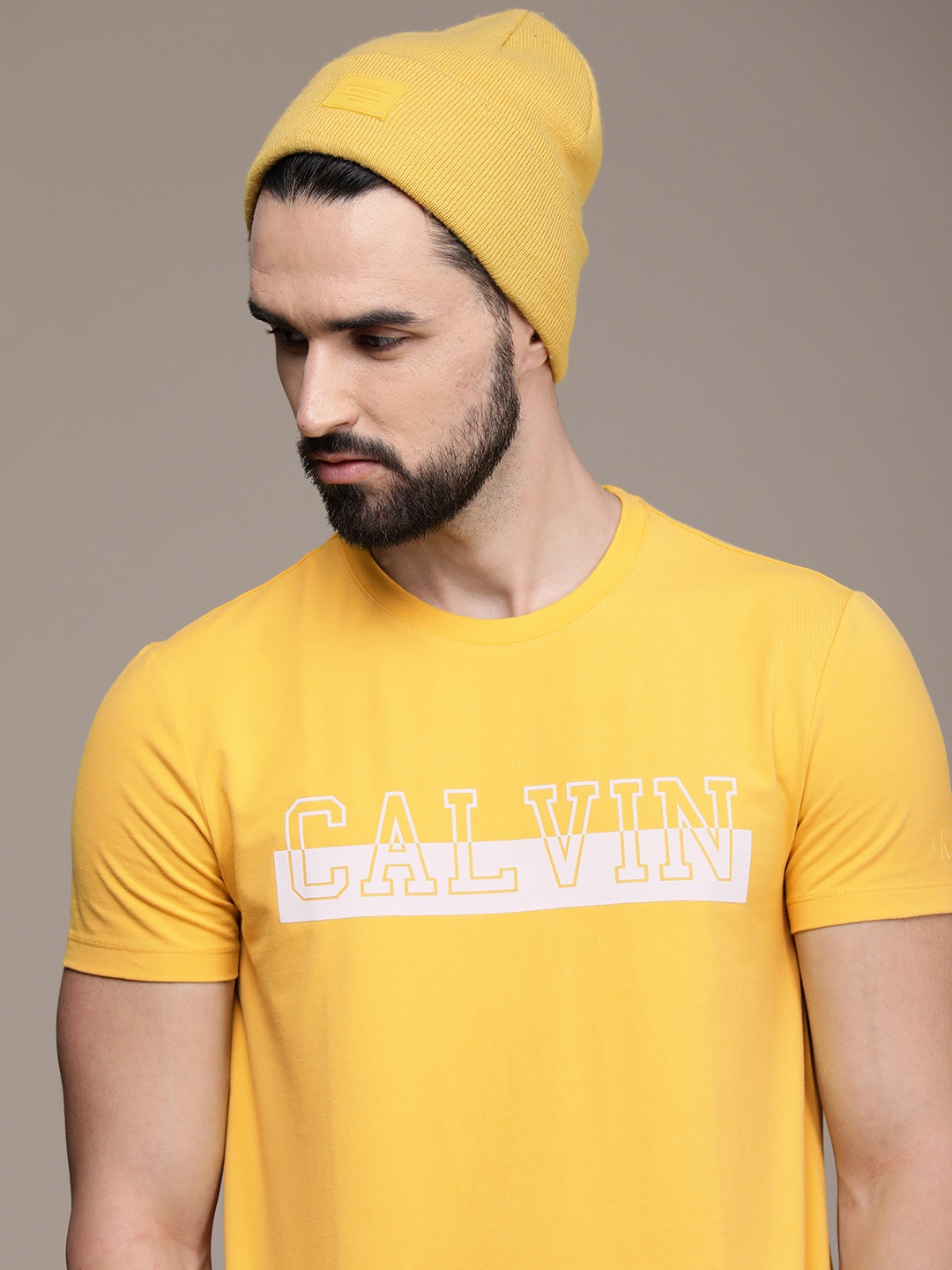 

Calvin Klein Jeans Men Yellow Brand Logo Printed Slim Fit T-shirt
