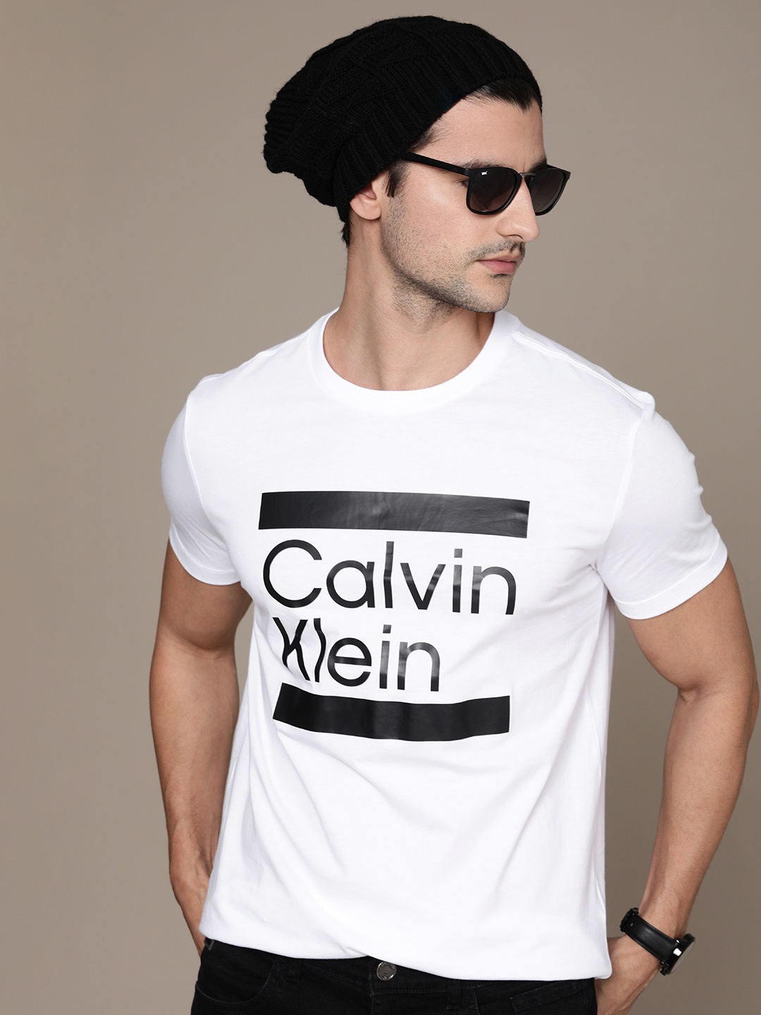 

Calvin Klein Jeans Men White Pure Cotton Solid T-shirt With Black Placement Print Surface