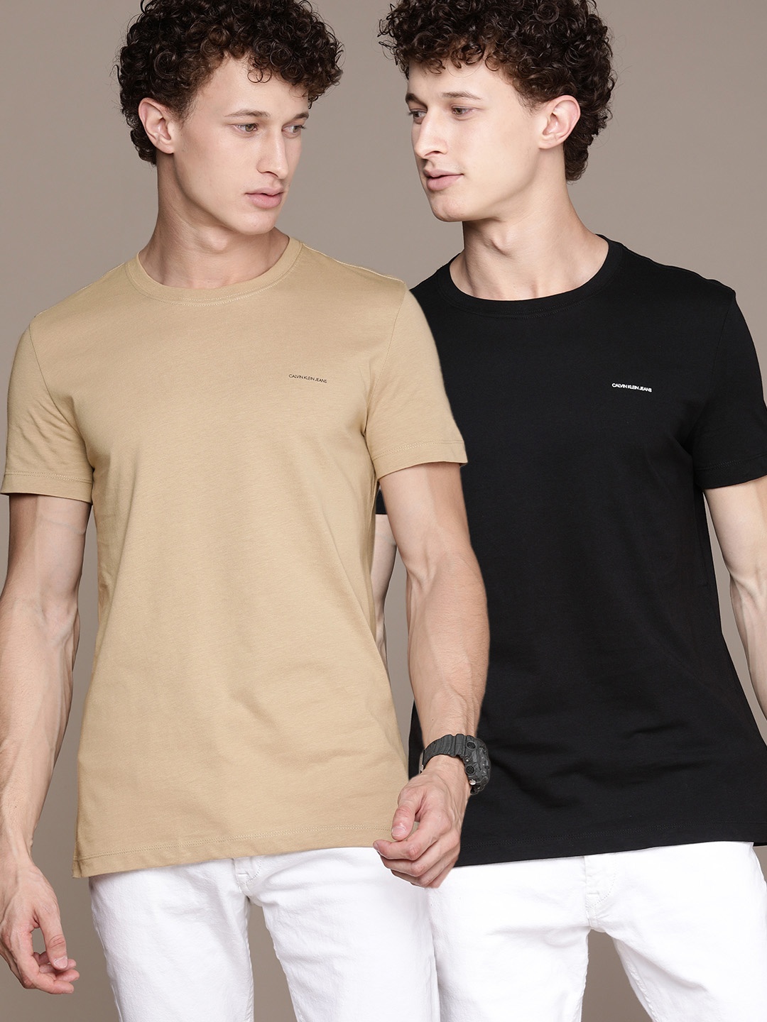 

Calvin Klein Jeans Men Pack of 2 Brown Black 2 Solid Slim Fit Pure Cotton T-shirt