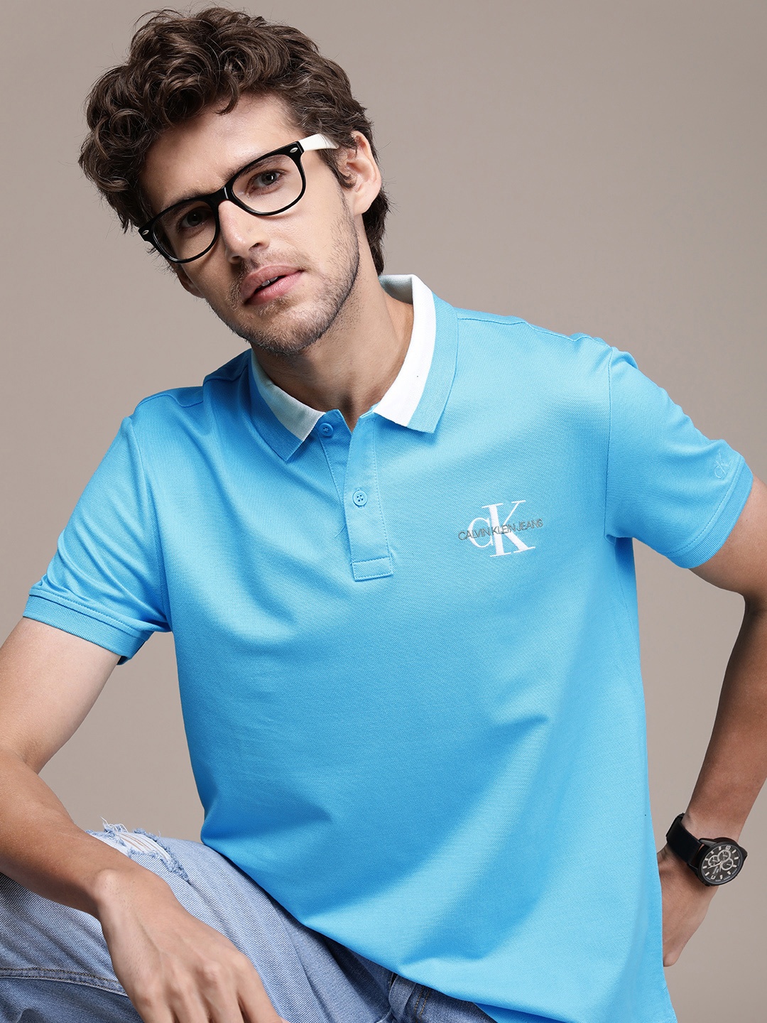 

Calvin Klein Jeans Men Blue & White Colourblocked Polo Collar Pure Cotton Casual T-shirt