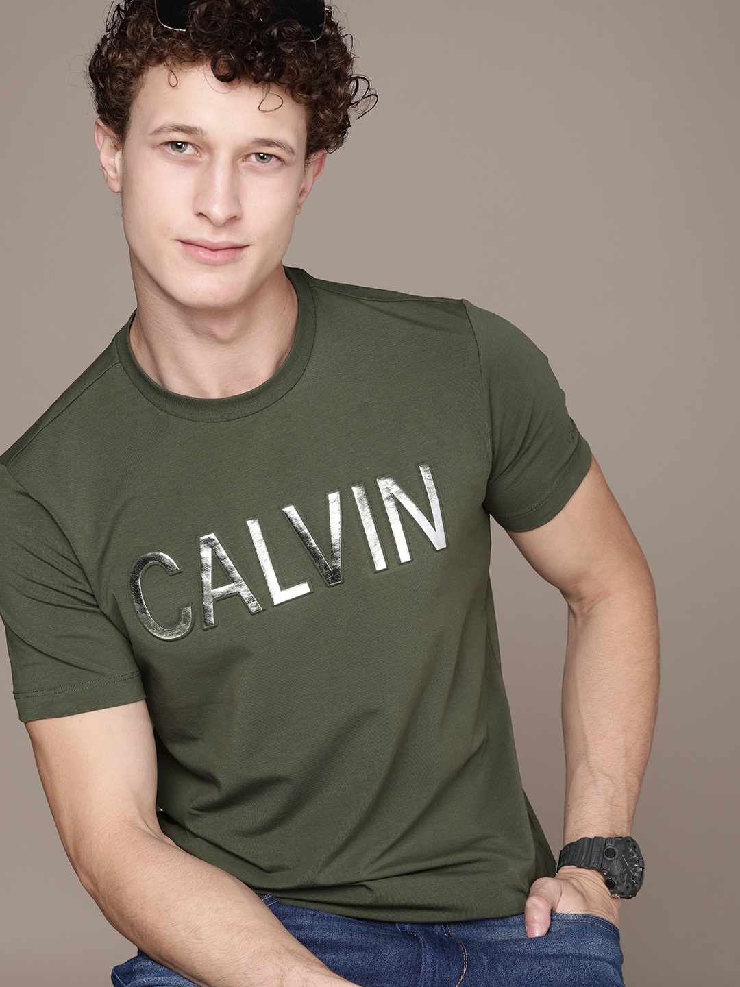 

Calvin Klein Jeans Men Green Brand Logo Embossed Slim Fit T-shirt