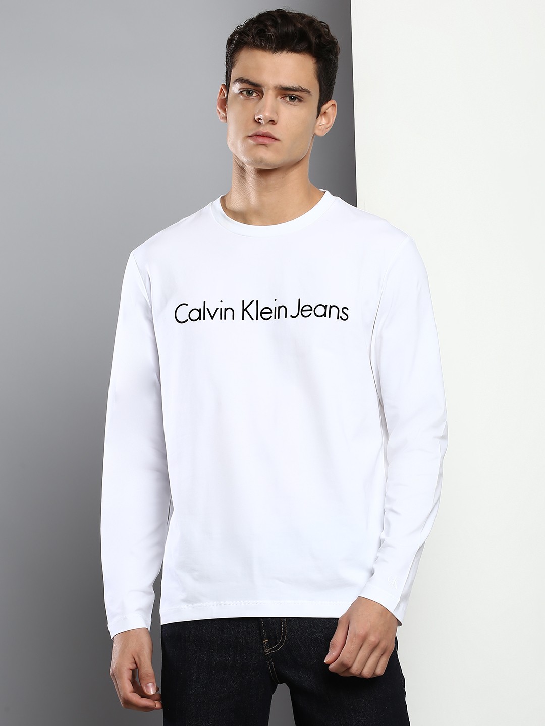 

Calvin Klein Jeans Men White Brand Logo Printed Round-Neck Casual T-shirt
