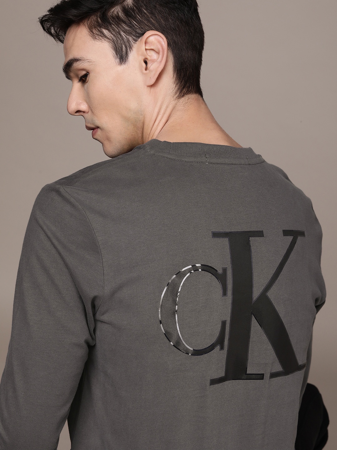 

Calvin Klein Jeans Men Grey Brand Logo Printed Pure Cotton T-shirt