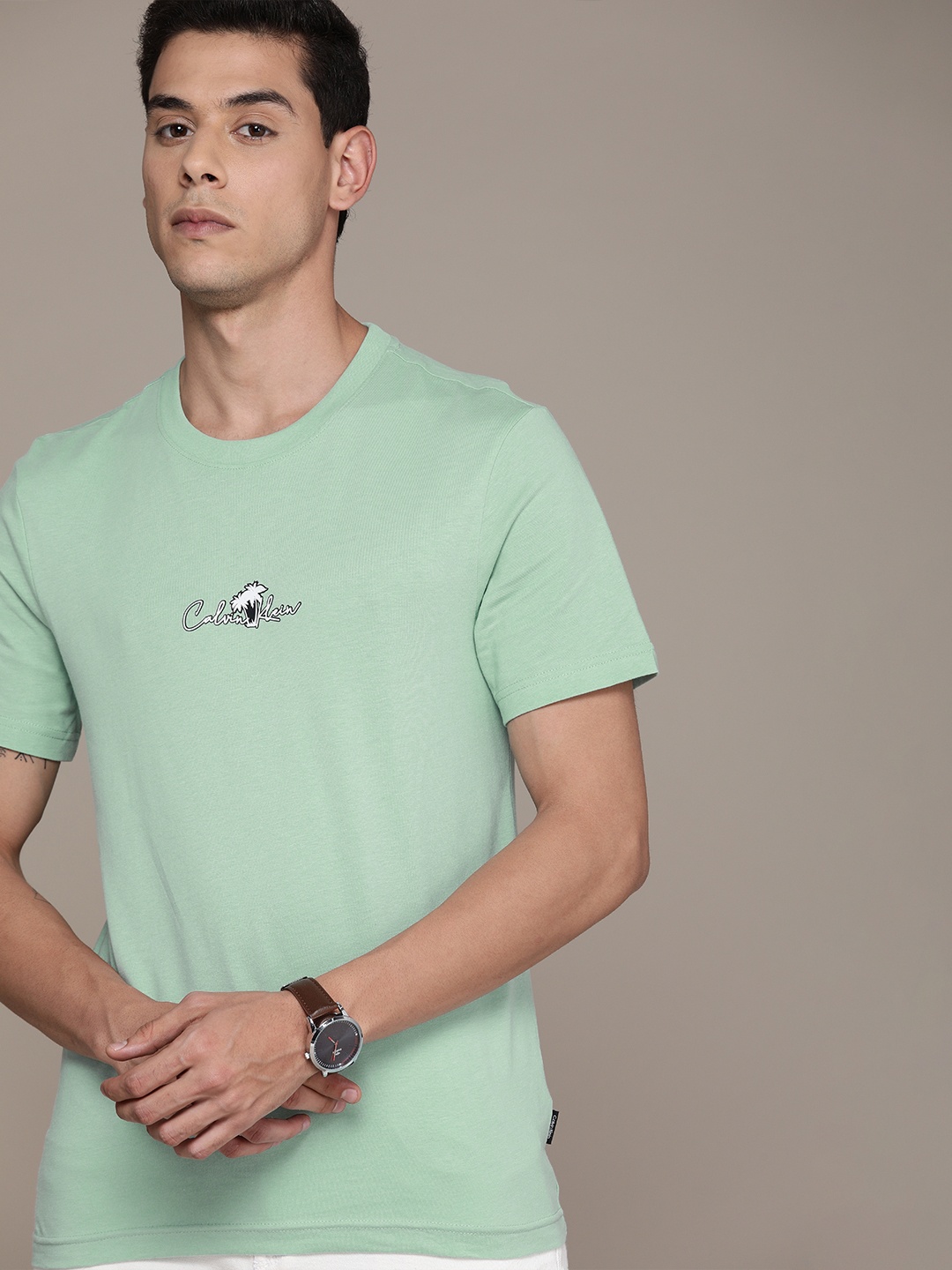 

Calvin Klein Jeans Men Sea Green Brand Logo Printed T-shirt