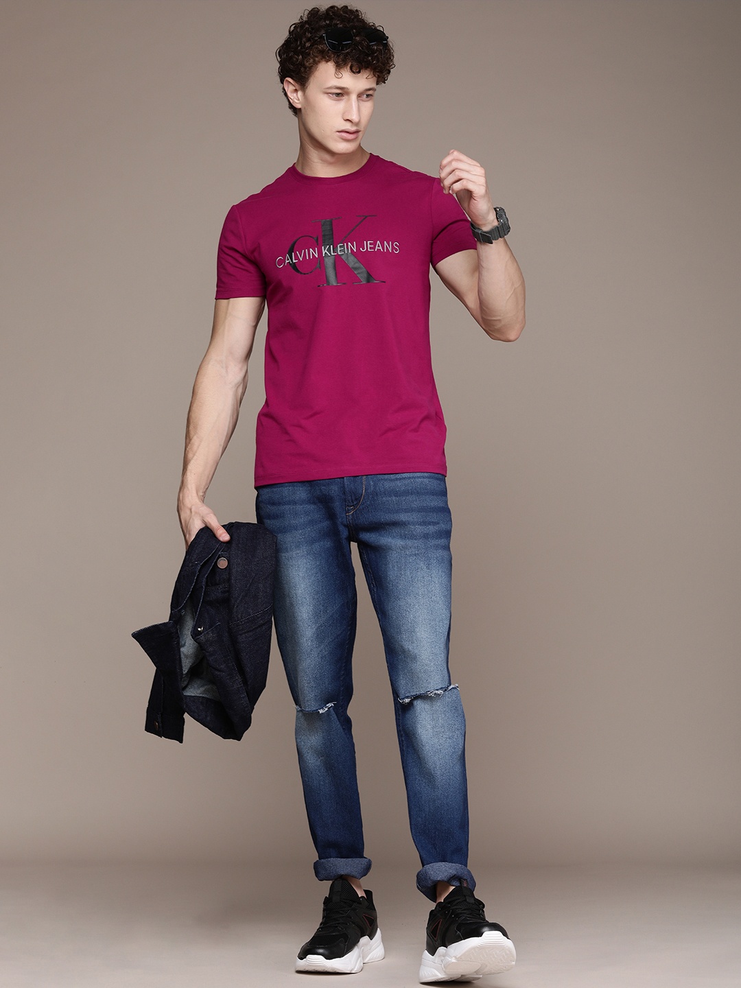

Calvin Klein Jeans Men Maroon Brand Logo Printed Slim Fit T-shirt