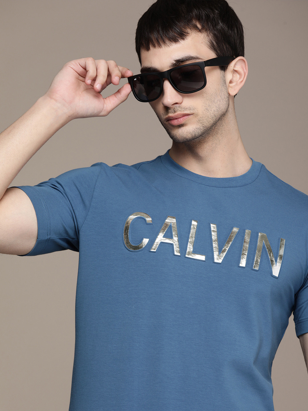 

Calvin Klein Jeans Men Blue Logo Embossed T-shirt