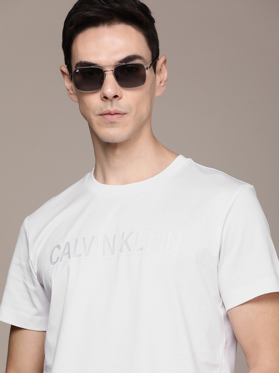 

Calvin Klein Jeans Men White Grey Printed Pure Cotton T-shirt