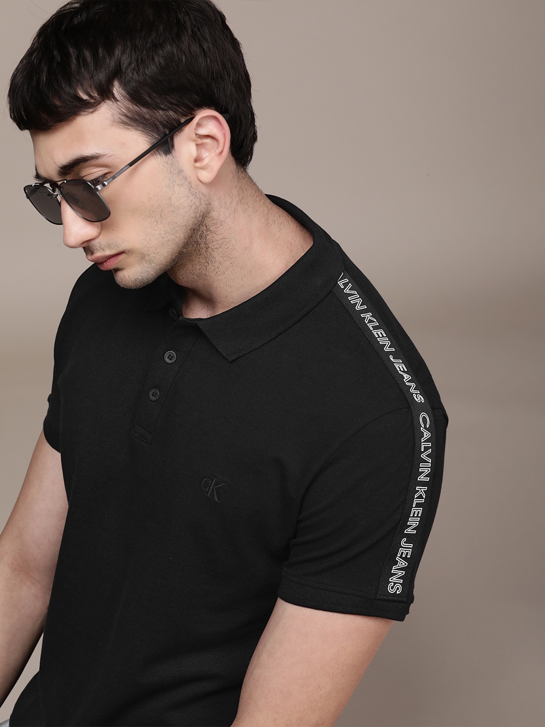 

Calvin Klein Jeans Men Black Solid Polo Collar Slim Fit T-shirt
