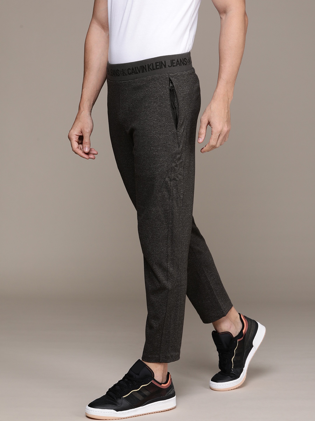 

Calvin Klein Jeans Men Charcoal Grey Solid Track Pants