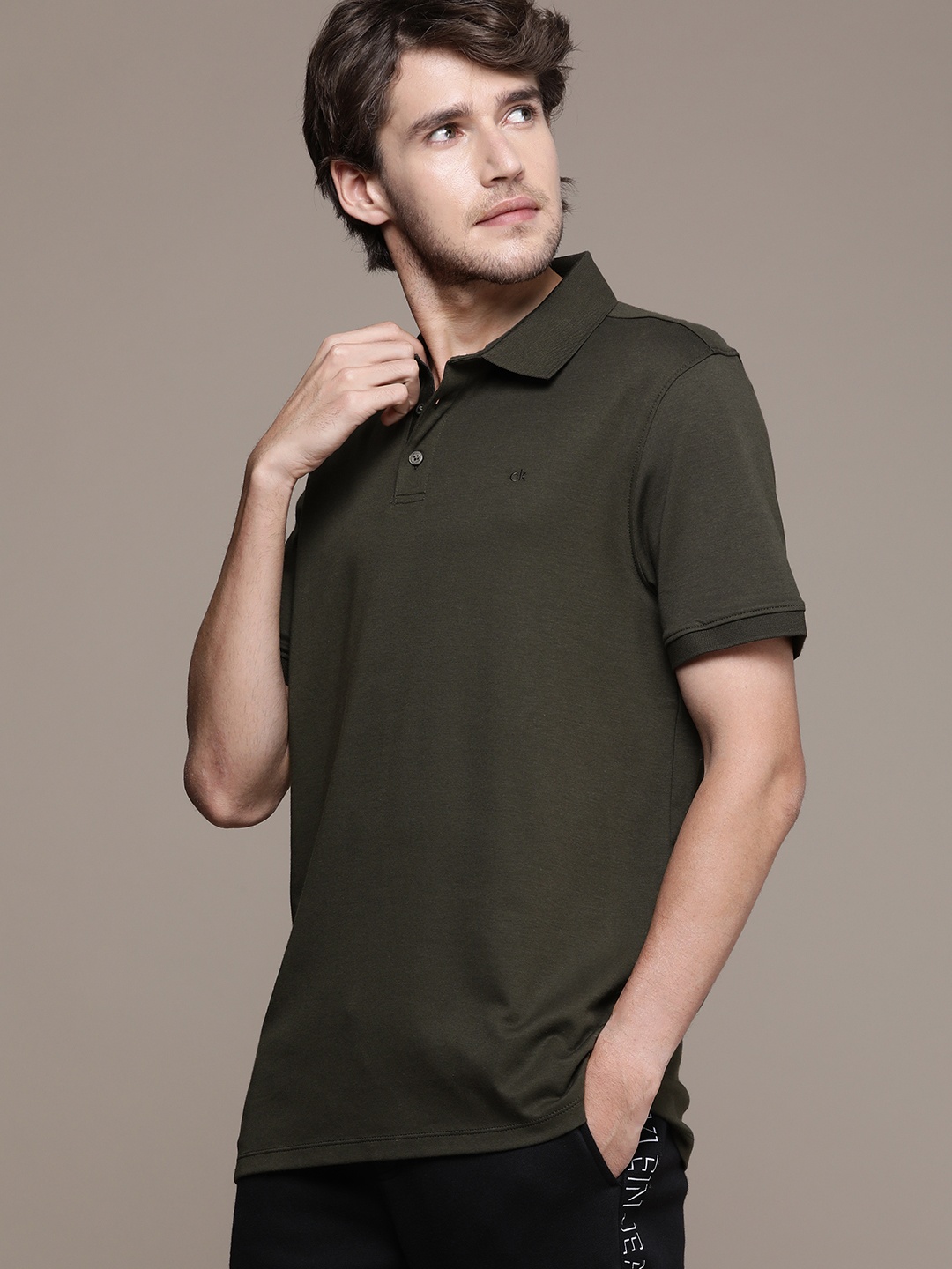 

Calvin Klein Jeans Men Olive Green Solid Polo Collar Pure Cotton T-shirt