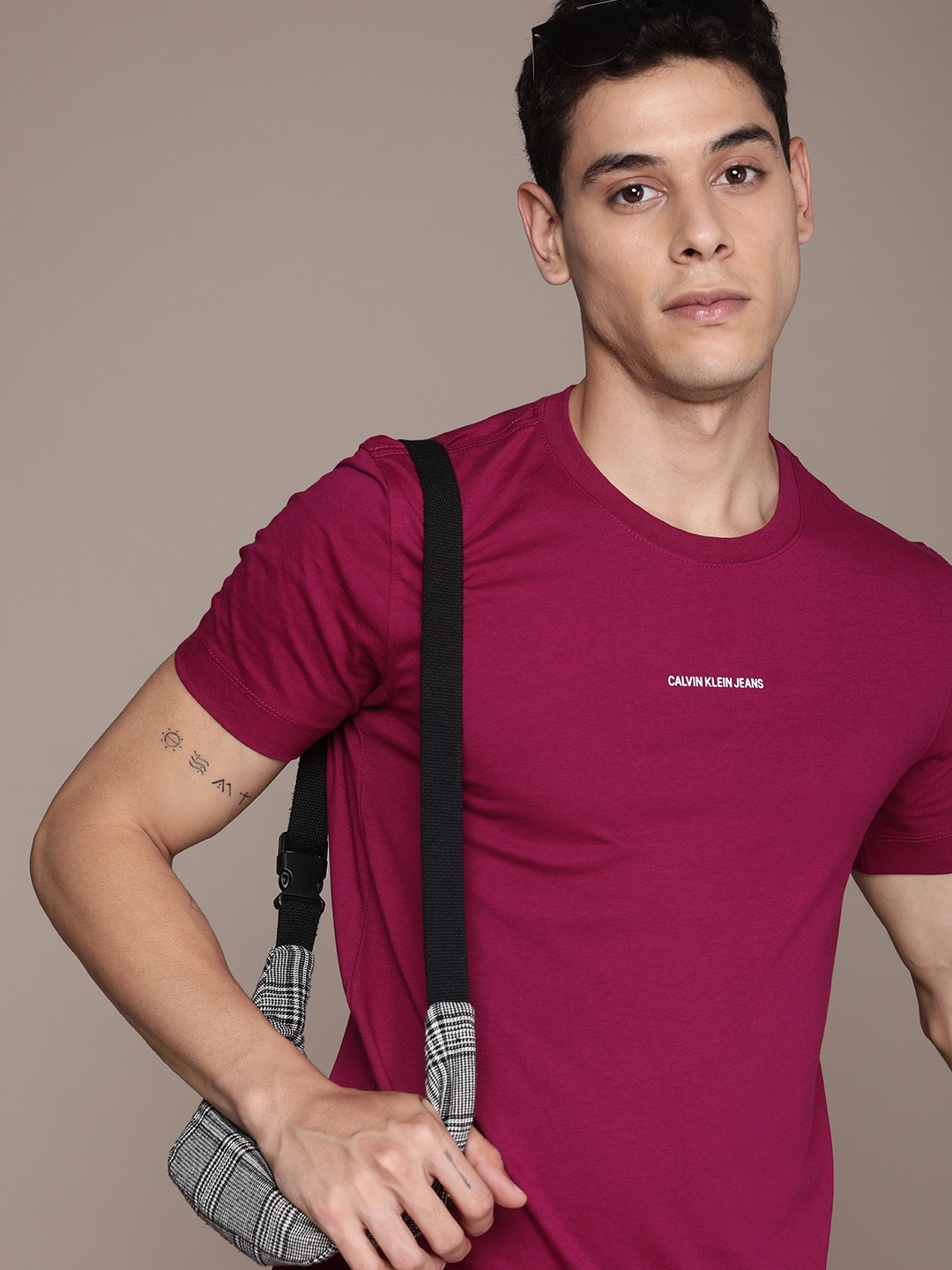 

Calvin Klein Jeans Men Maroon Pure Cotton Brand Logo Slim Fit Pure Cotton T-shirt