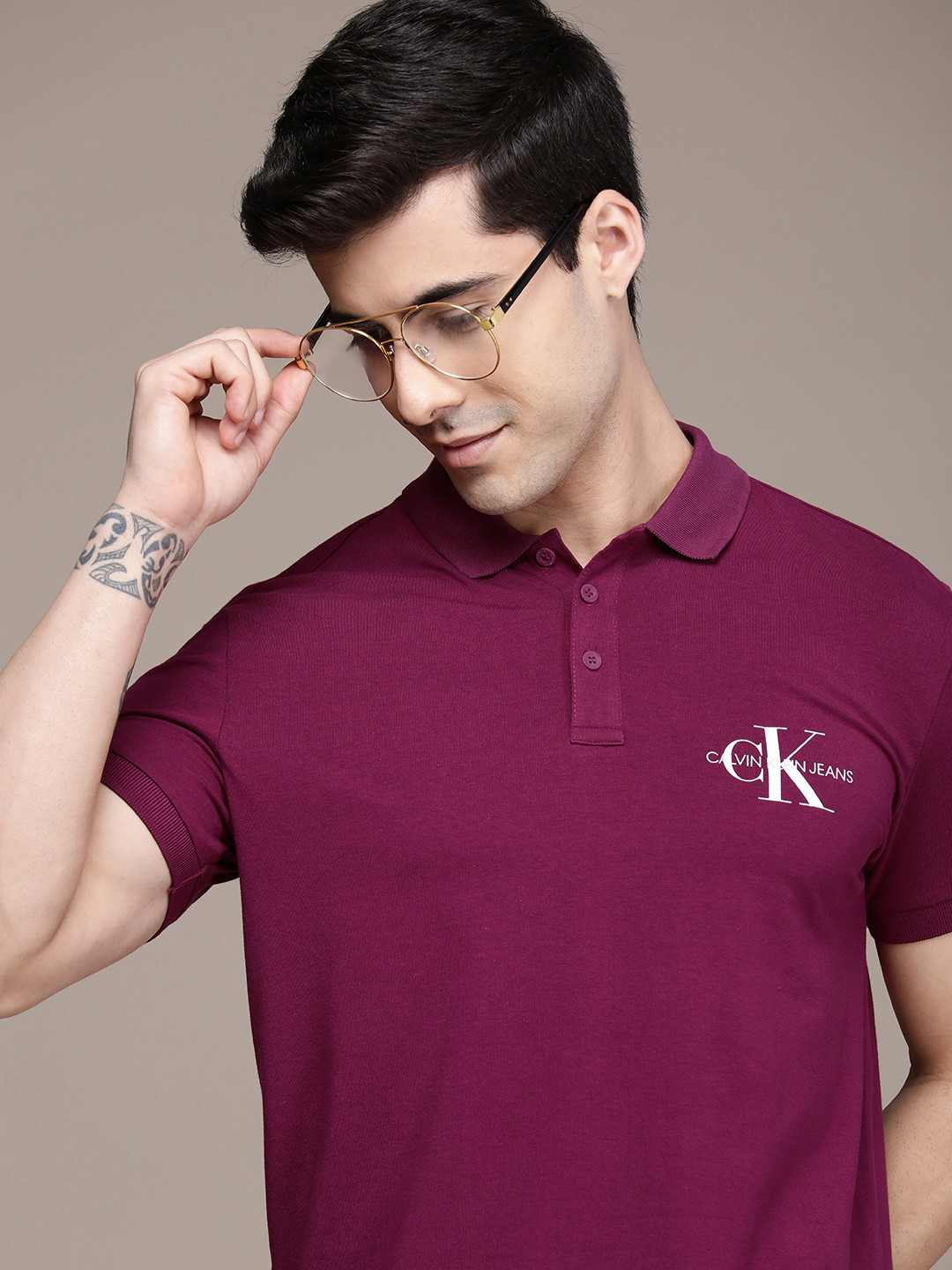 

Calvin Klein Jeans Men Fuchsia Brand Logo Printed Polo Collar Slim Fit Casual T-shirt