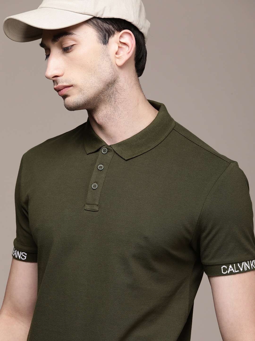 

Calvin Klein Jeans Men Olive Solid Polo Collar T-shirt