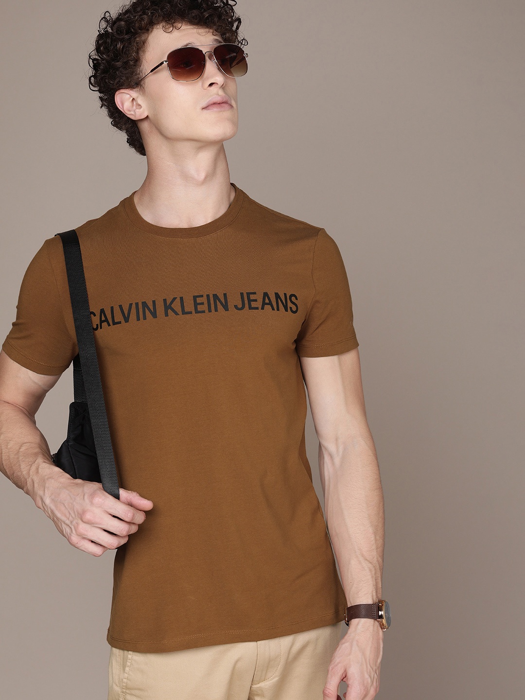 

Calvin Klein Jeans Men Brown Brand Logo Regular Fit T-shirt