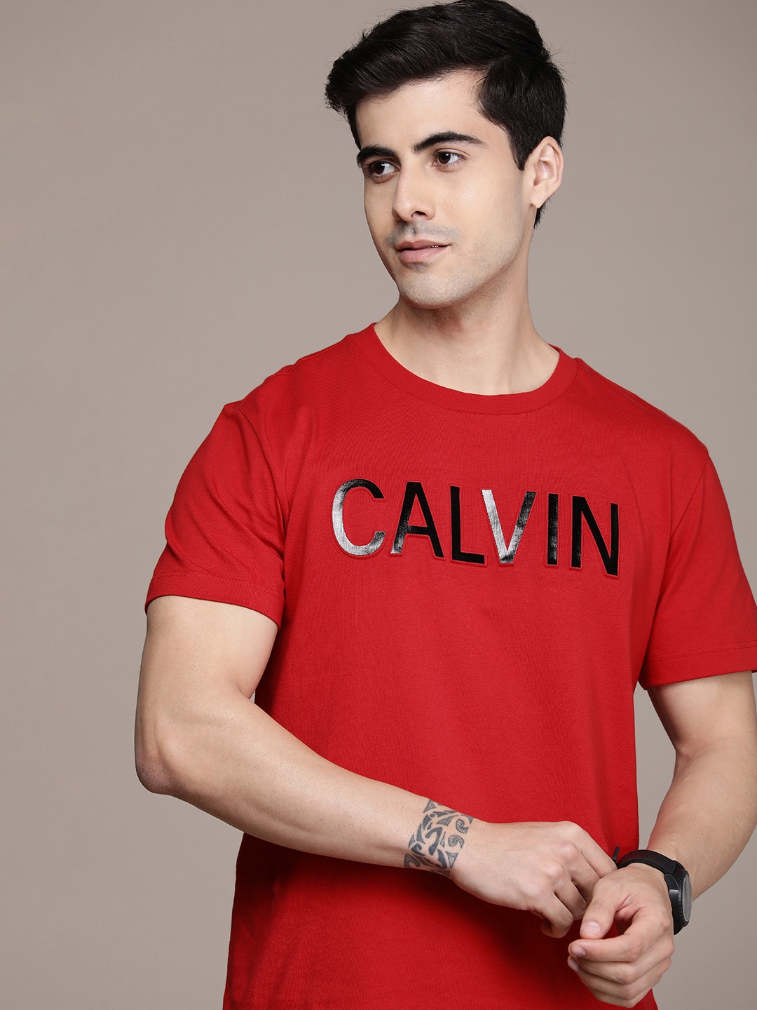 

Calvin Klein Jeans Men Red & Black Flock Print Pure Cotton Casual T-shirt