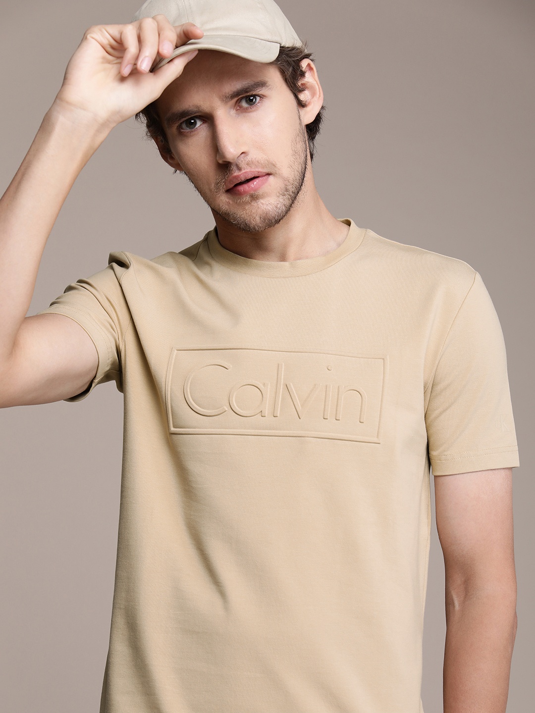 

Calvin Klein Jeans Men Brown Embossed Printed Brand Logo Slim Fit T-shirt