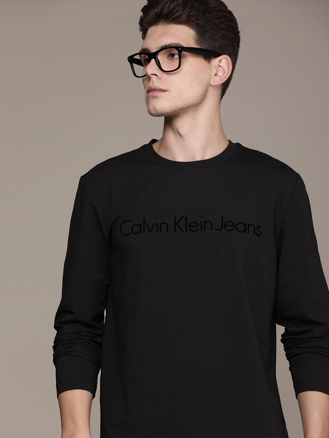 

Calvin Klein Jeans Men Black Brand Logo Printed T-shirt