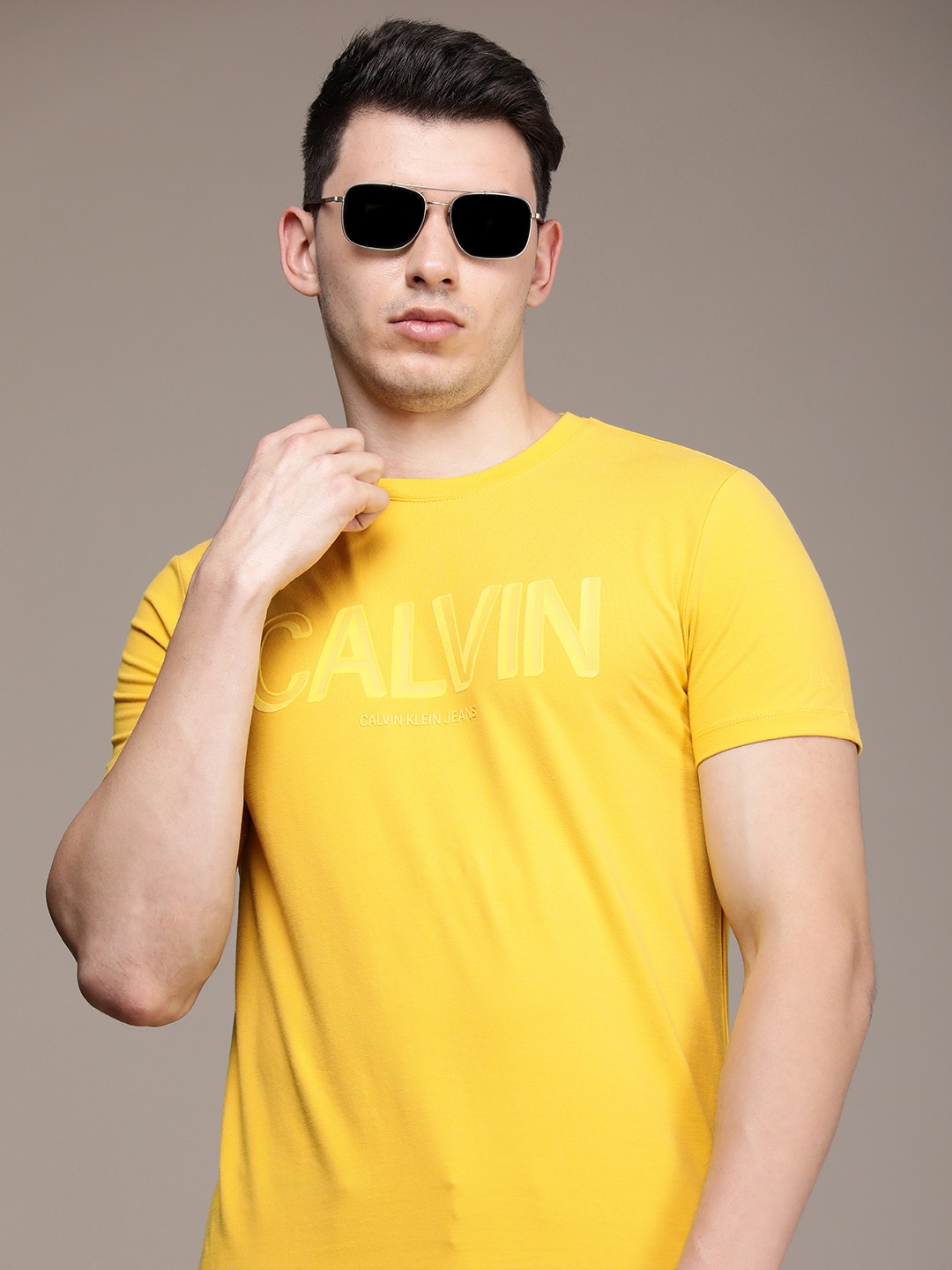 

Calvin Klein Jeans Men Yellow Brand Logo Printed Applique Slim Fit T-shirt