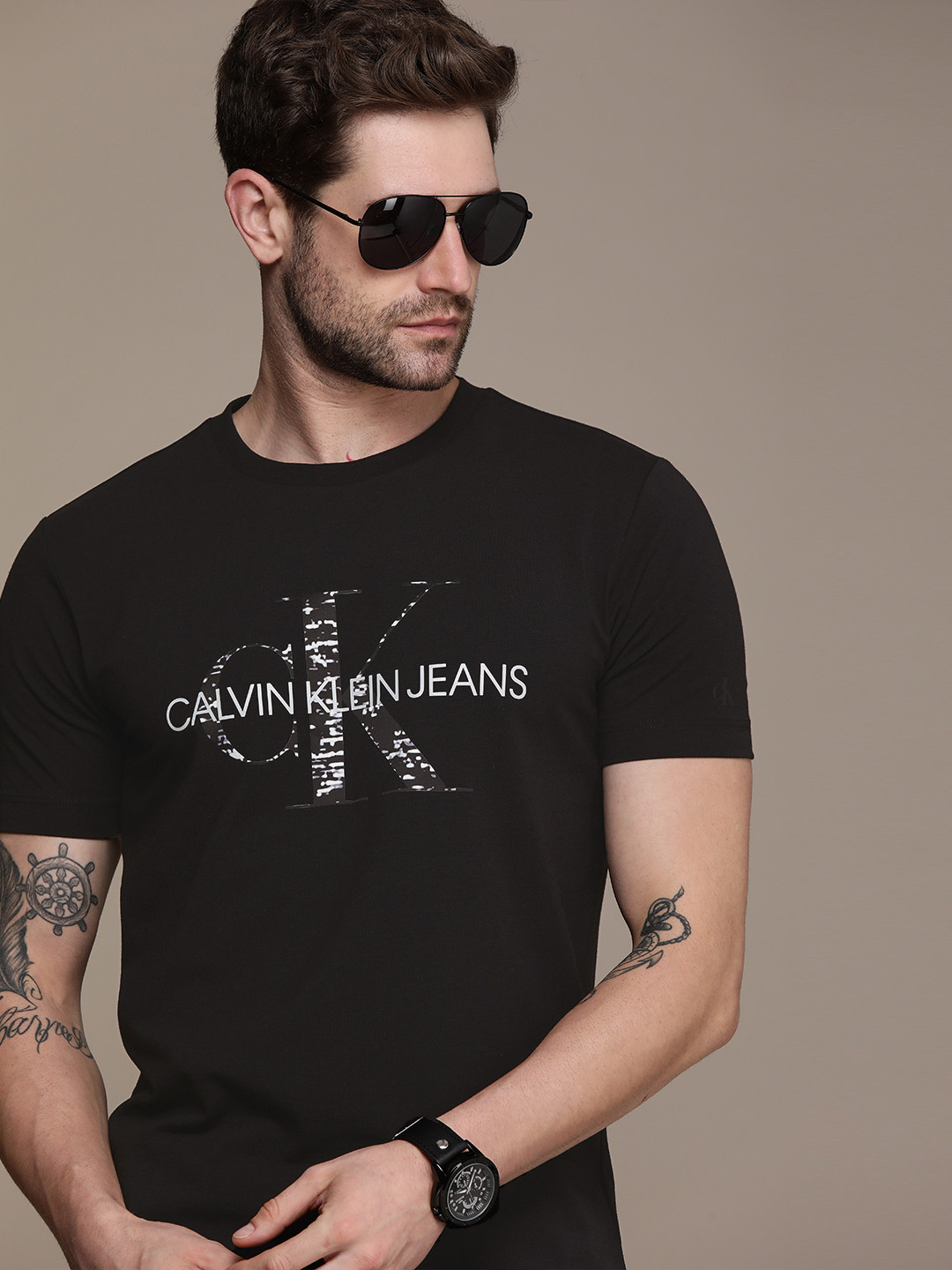

Calvin Klein Jeans Men Black Brand Logo Printed Slim Fit T-shirt