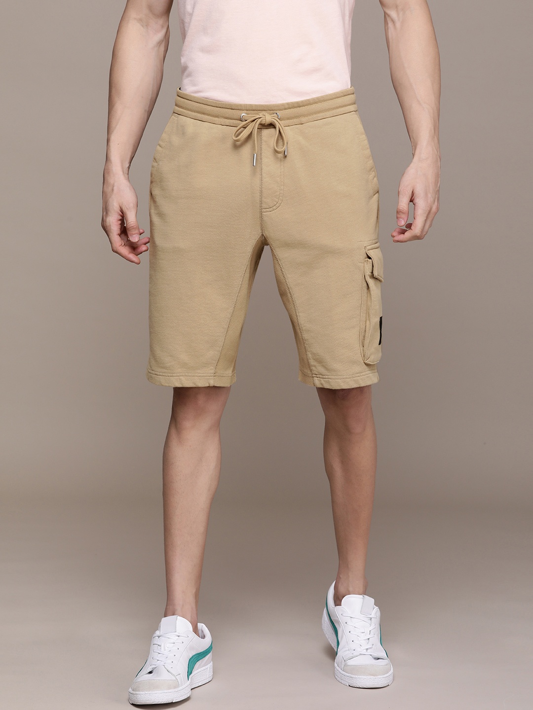 

Calvin Klein Jeans Men Brown Solid MONOGRAM PATCH HWK Regular Shorts