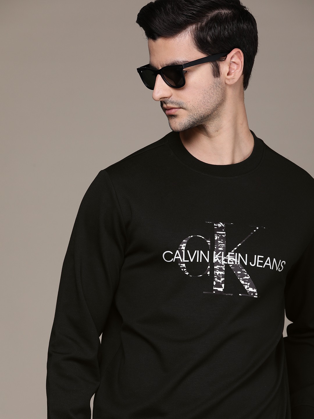 

Calvin Klein Jeans Men Black Printed Hooded Sweatshirt