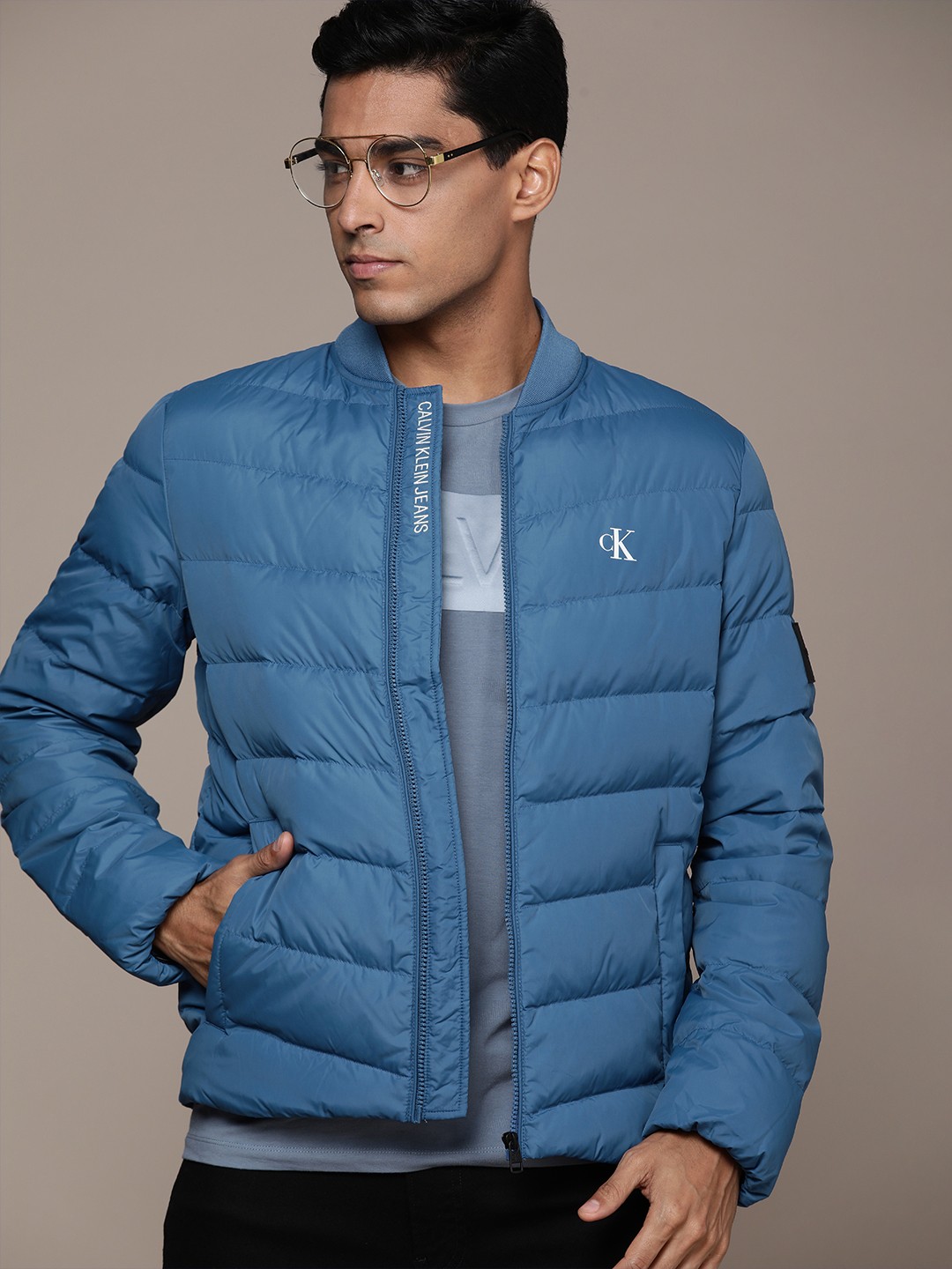 

Calvin Klein Jeans Men Teal Blue Solid Puffer Jacket