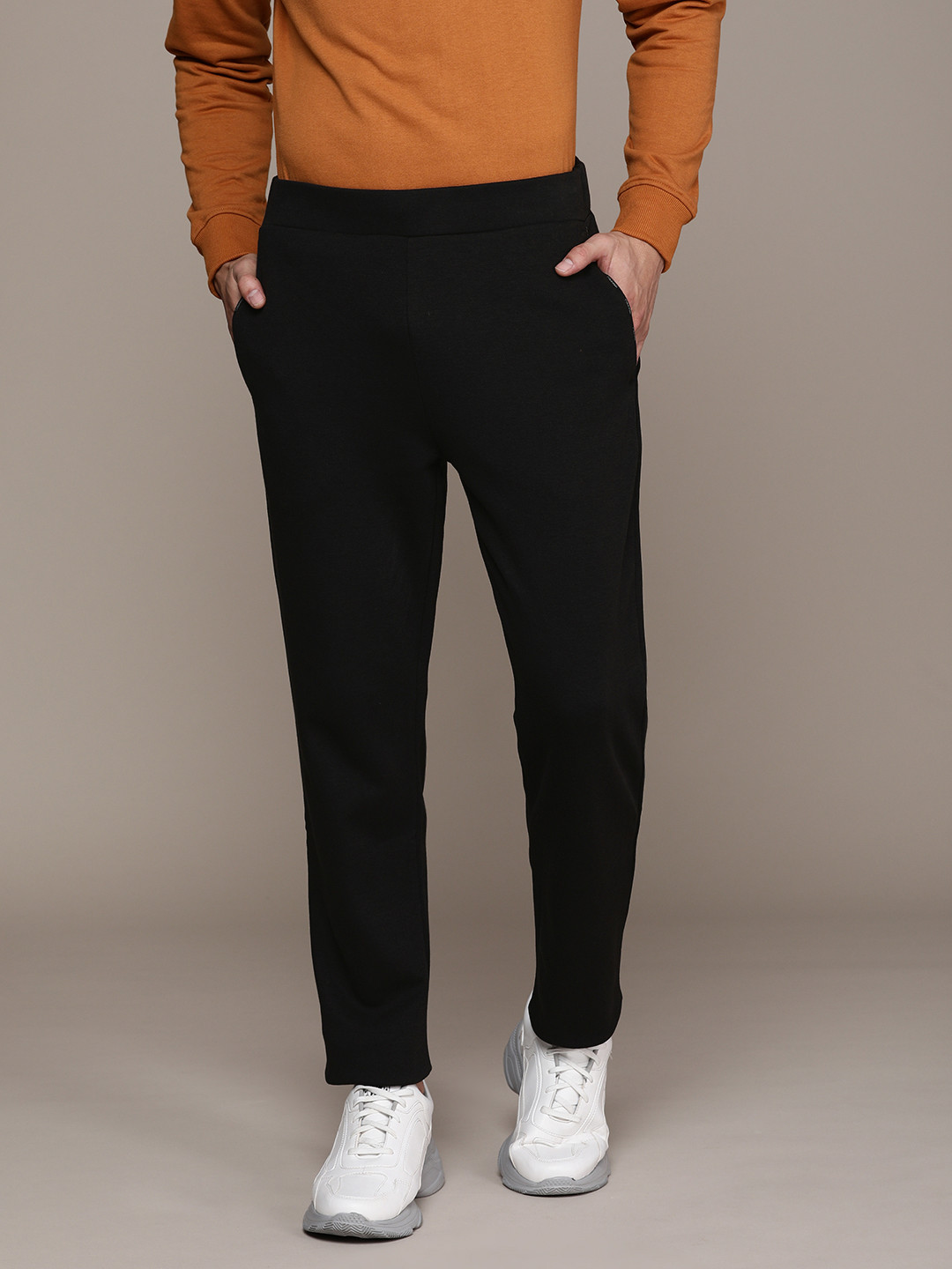 

Calvin Klein Jeans Men Black Solid Track Pants