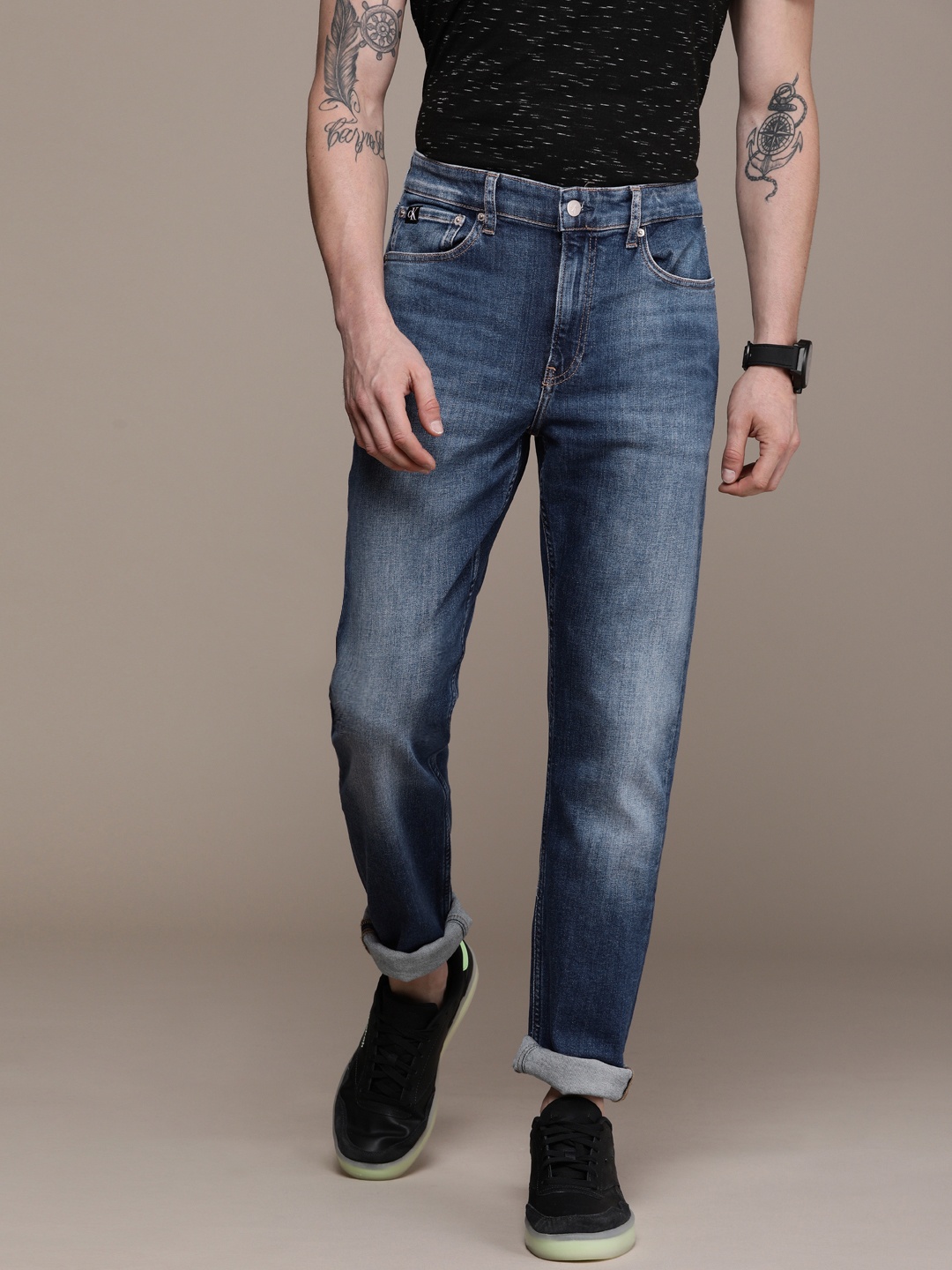 

Calvin Klein Jeans Men Blue Slim Tapered Fit Light Fade Stretchable Jeans